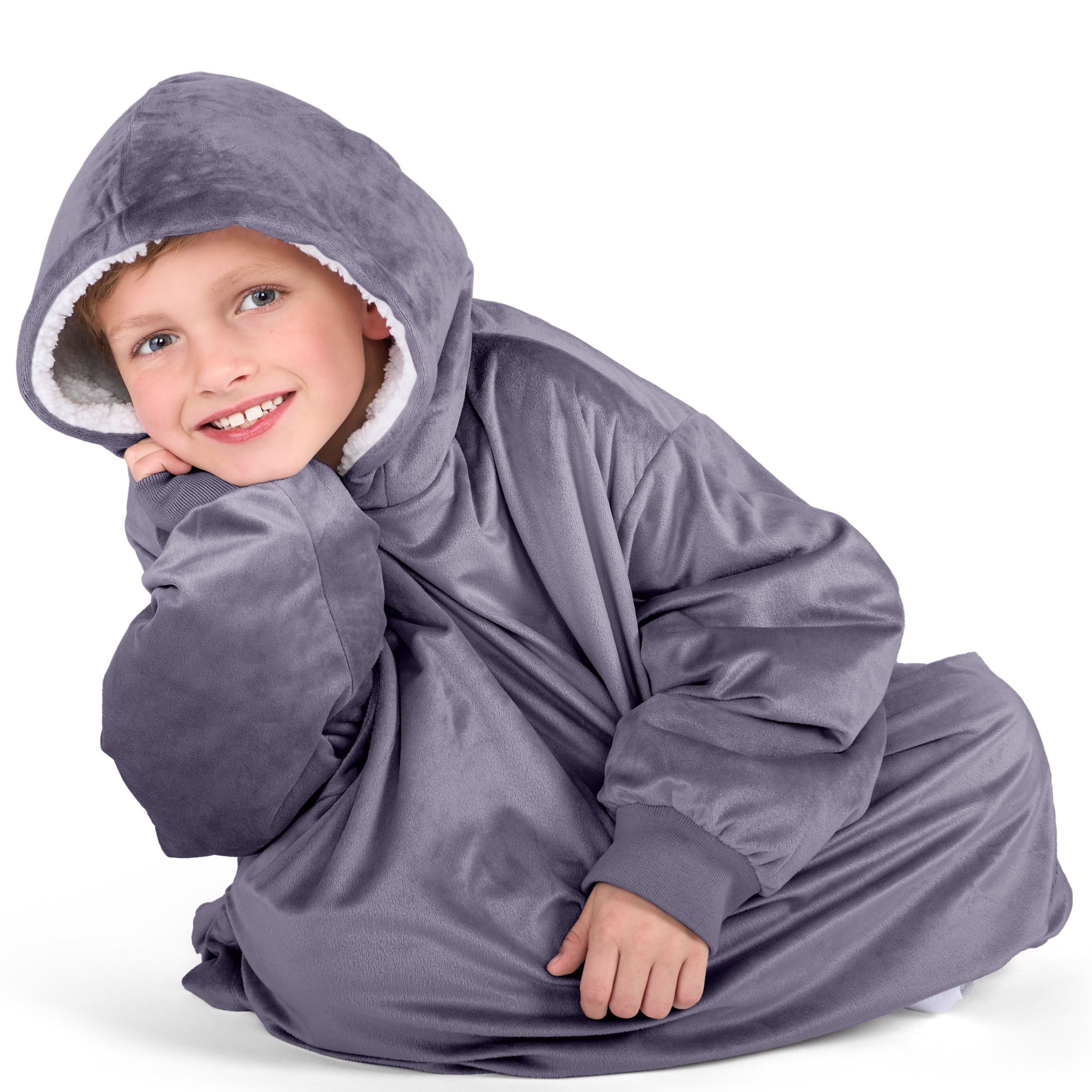 Close up of a sherpa wearable blanket on a child