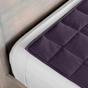 Close-up of a weighted blanket on a bed