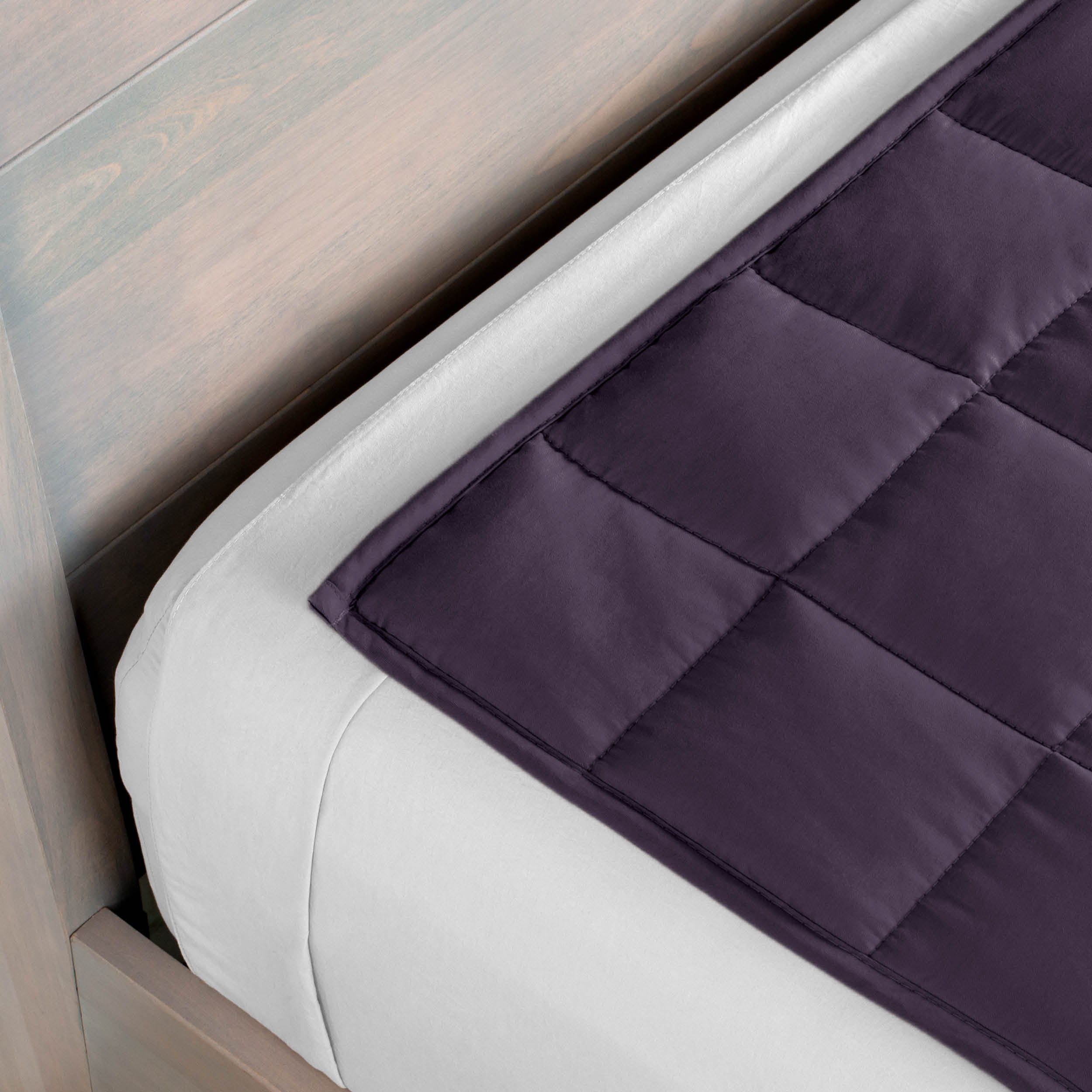 Close-up of a weighted blanket on a bed