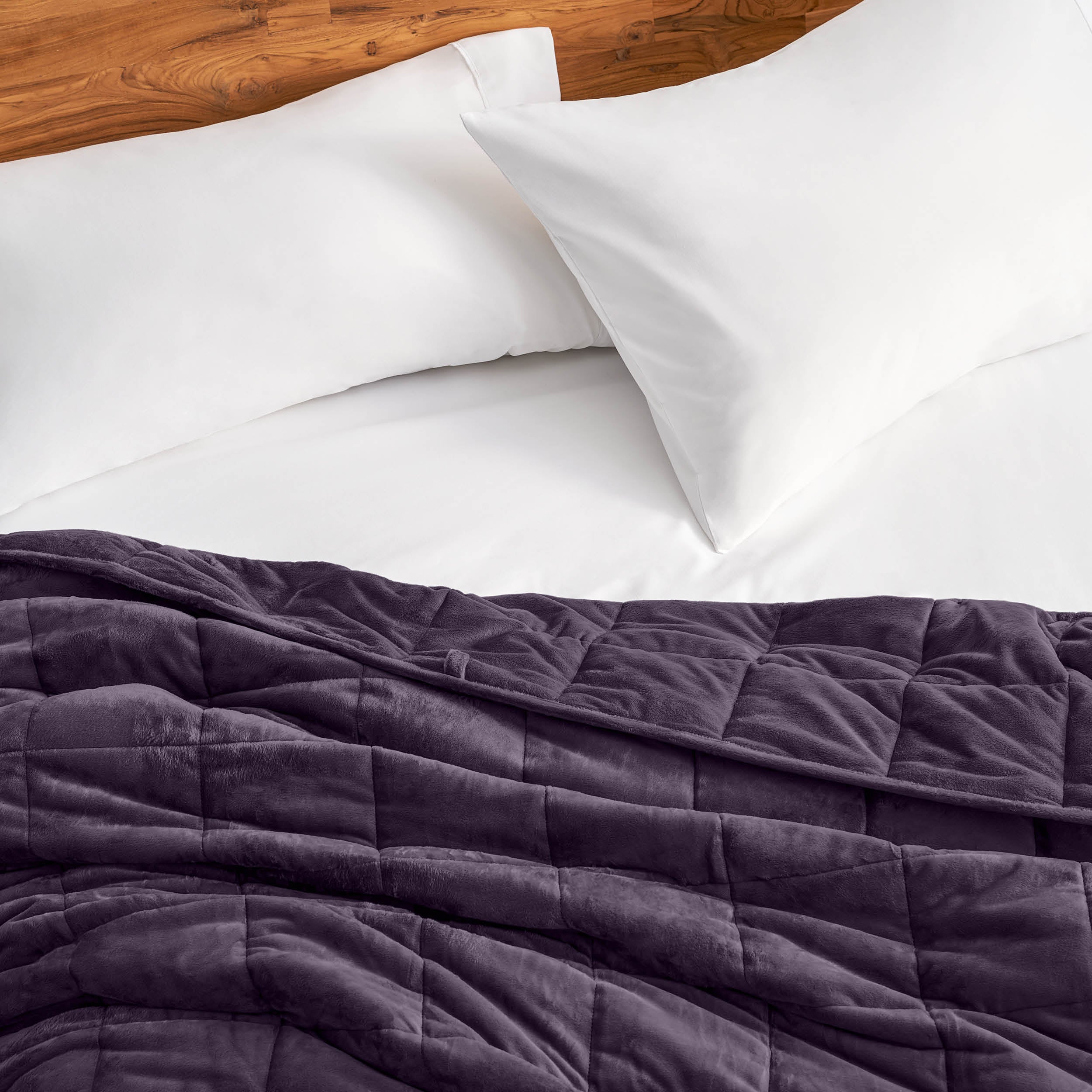Close-up of a minky weighted blanket on a bed
