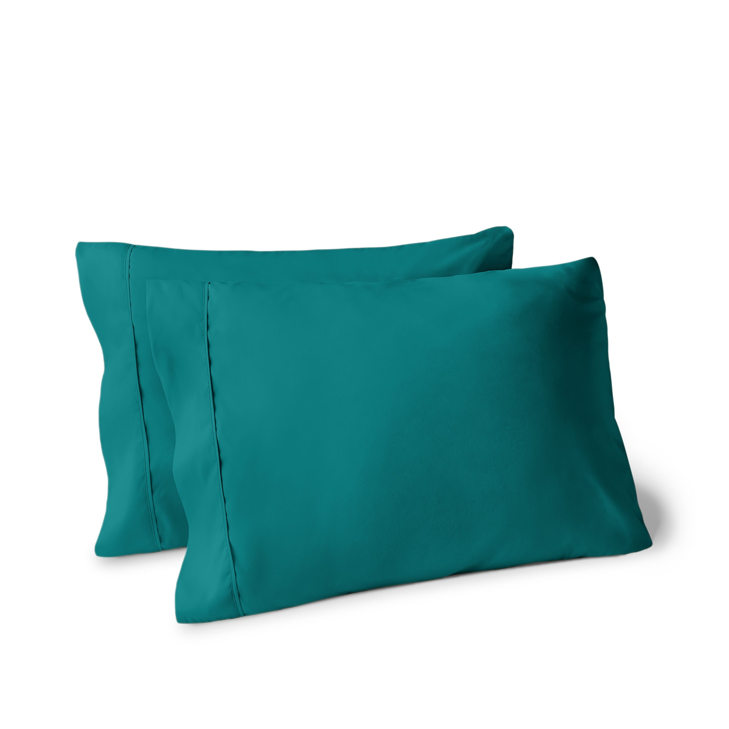 Two pillows on a white background with pillowcases on them