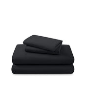 Cotton flannel sheet set folded and stacked on a white background
