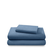 Cotton flannel sheet set folded and stacked on a white background