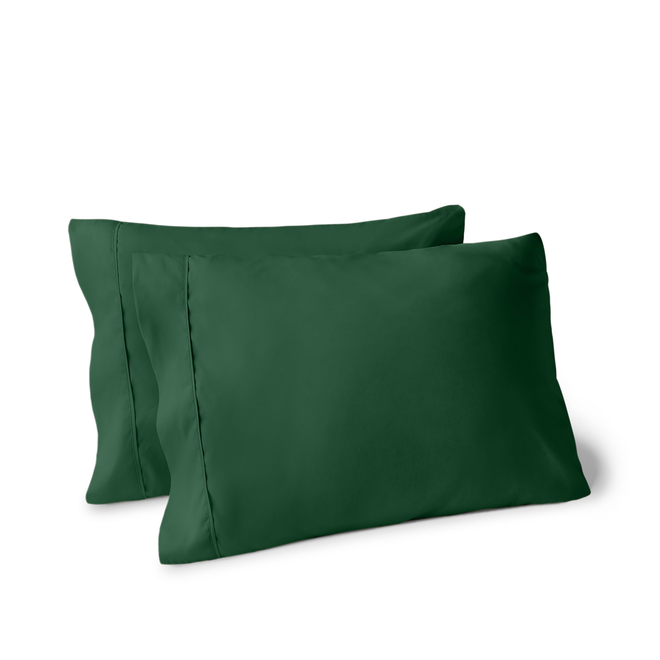 Two pillows on a white background with pillowcases on them