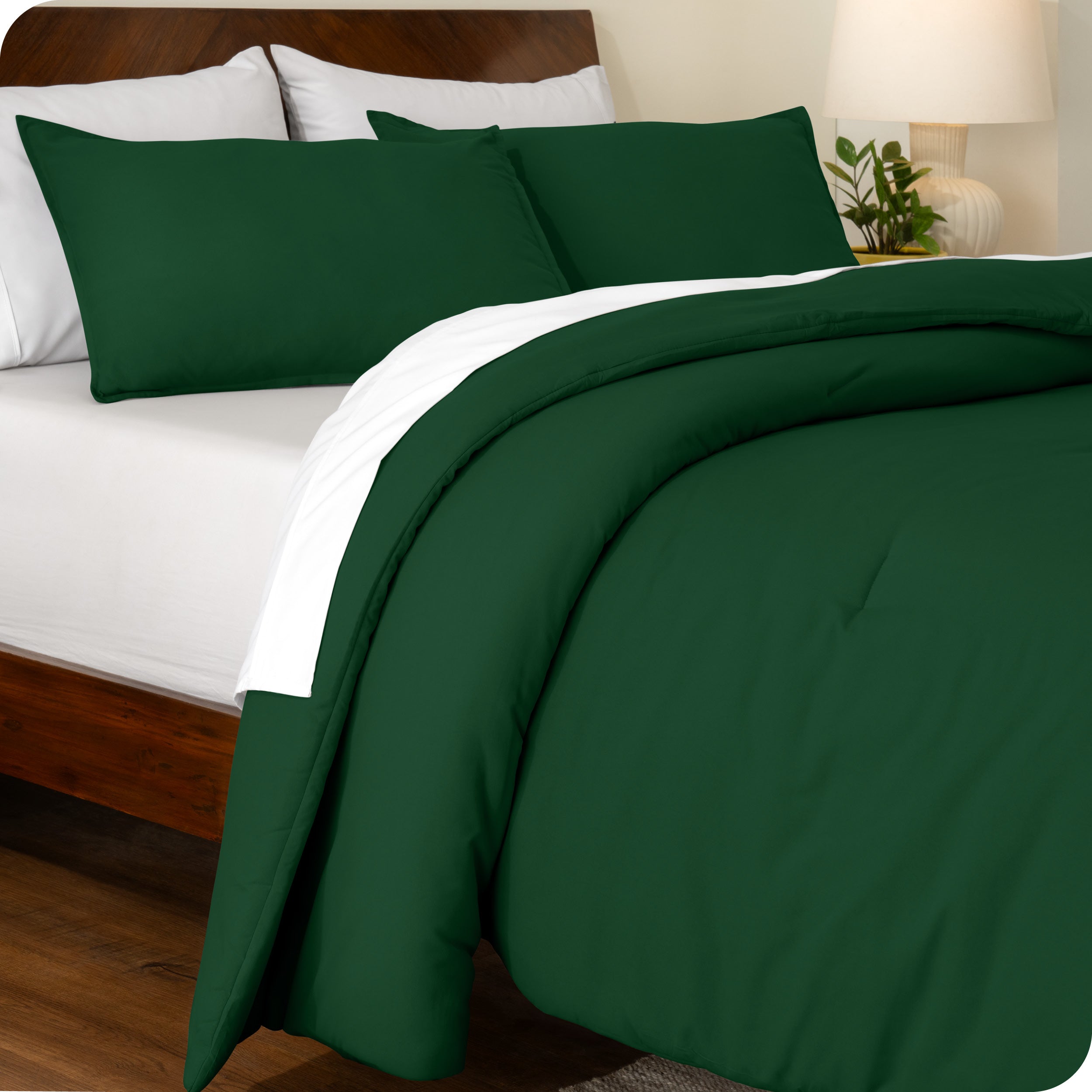 An angled view of a comforter set on a bed