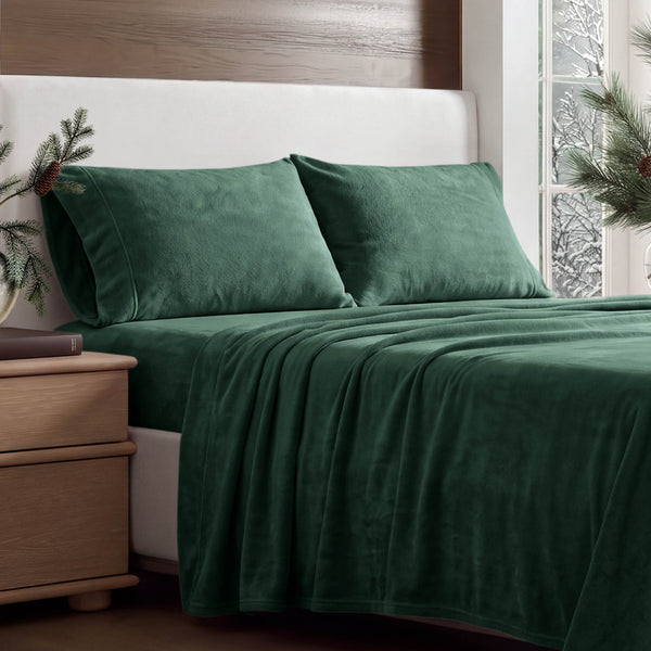 Soft microplush sheets covering a bed, showcasing the plush texture