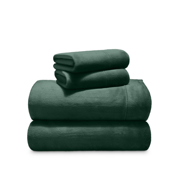 Stack of microplush sheets on a white background