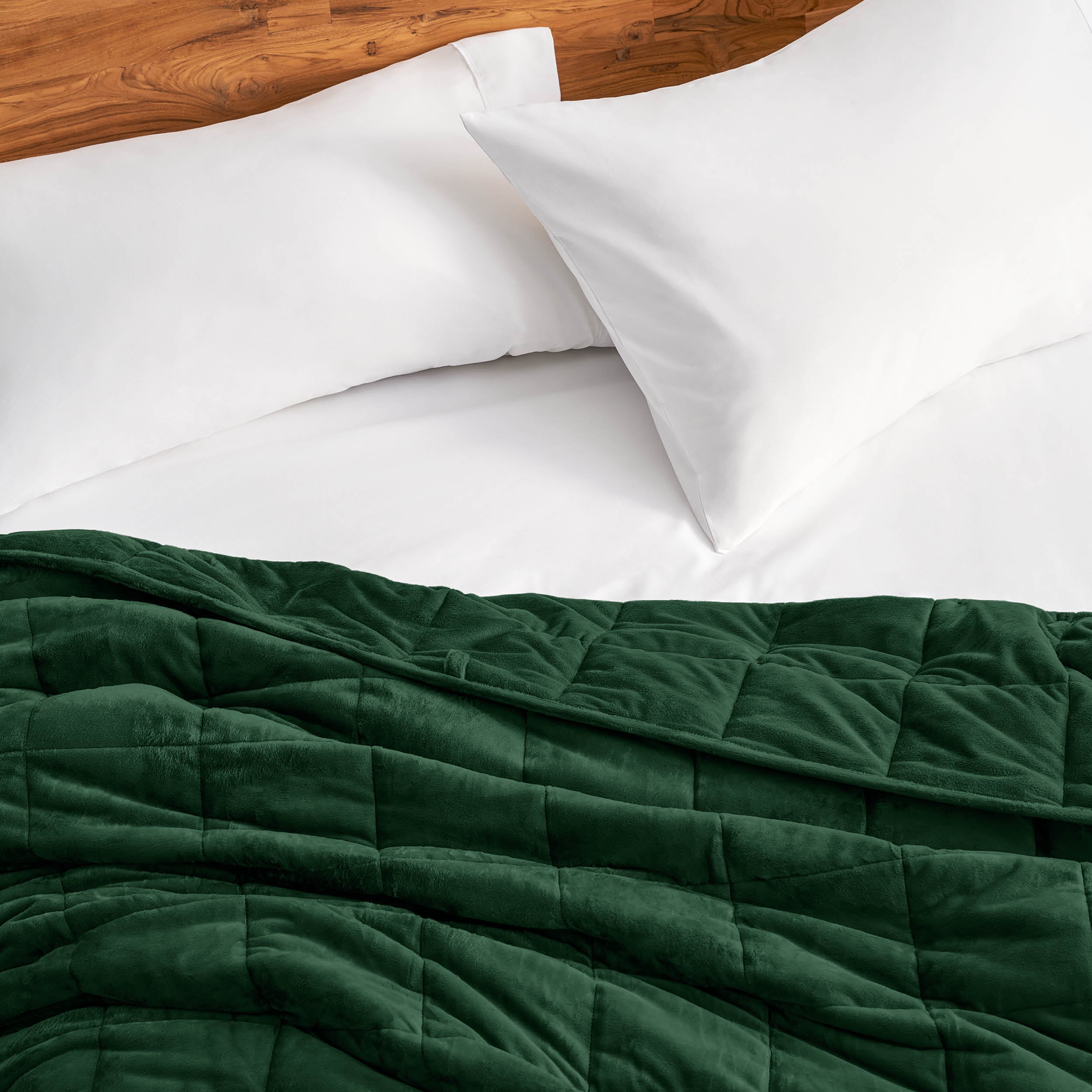 Close-up of a minky weighted blanket on a bed