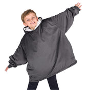 A child with a wearable blanket on