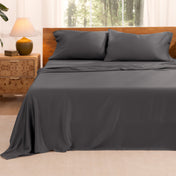 A bed neatly made with sheets