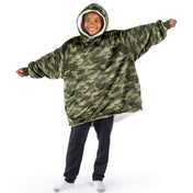 A child wearing a hooded blanket
