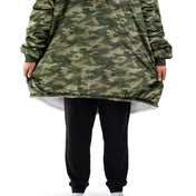 Child wearing a Bare Home wearable blanket