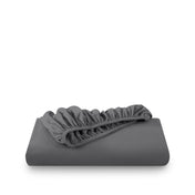 Grey fitted sheet on white background