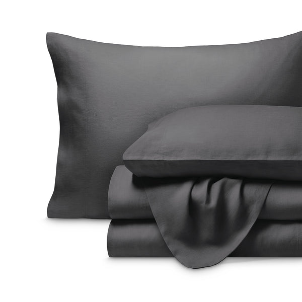 Linen sheet set folded with a white background