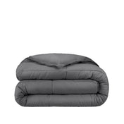 A grey duvet insert folded