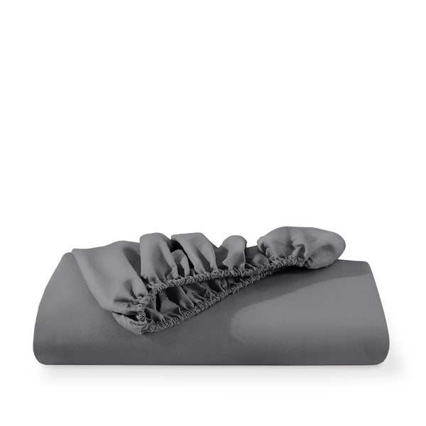 Microfiber fitted sheet folded with a white background