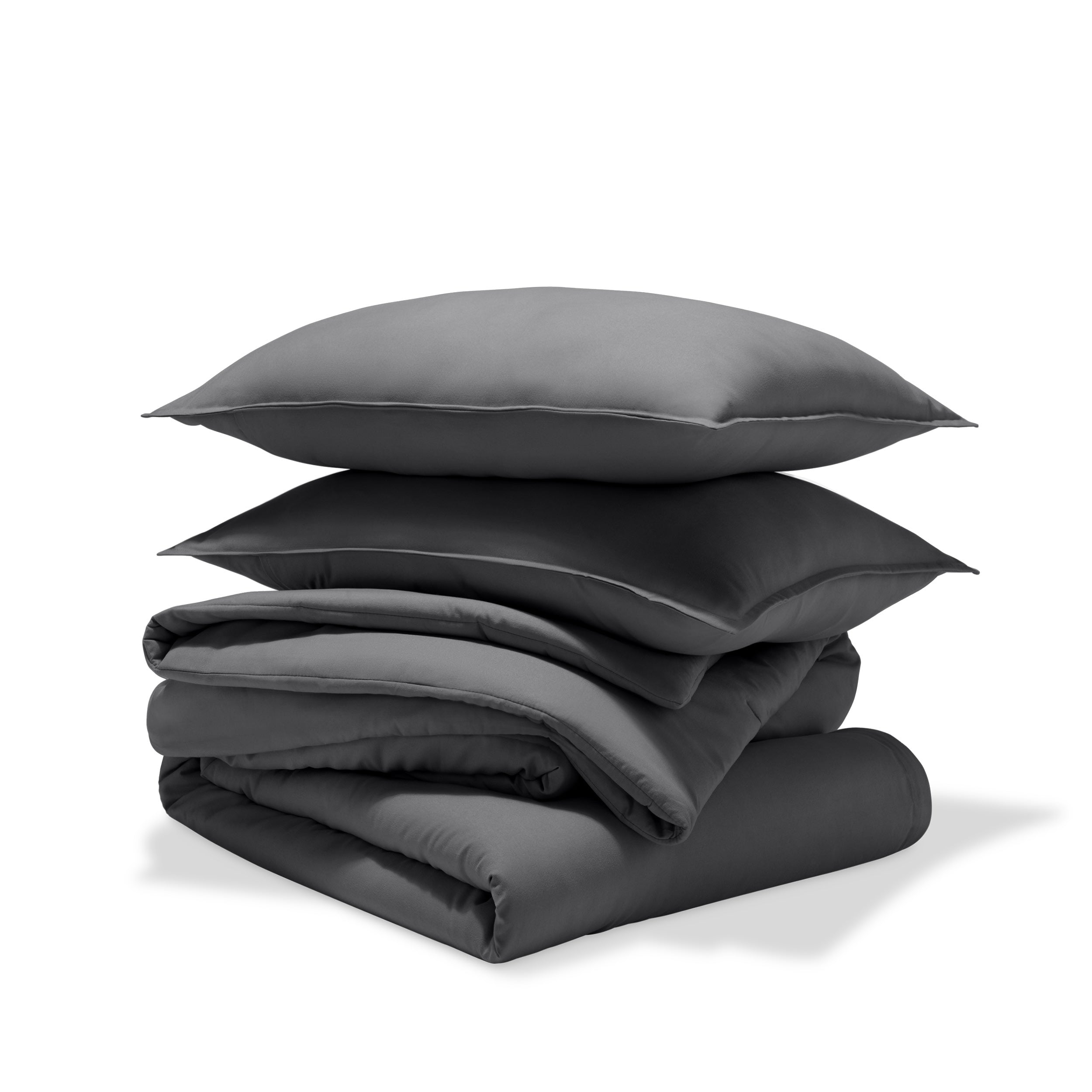 A comforter set folded and stacked