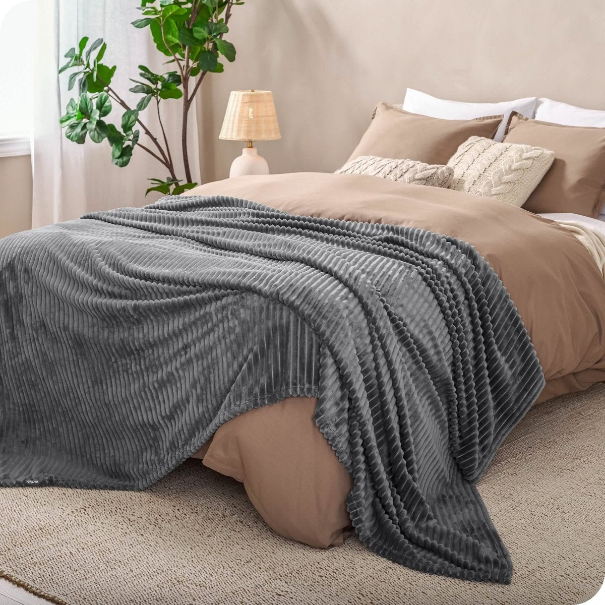 Microplush ribbed blanket on a bed