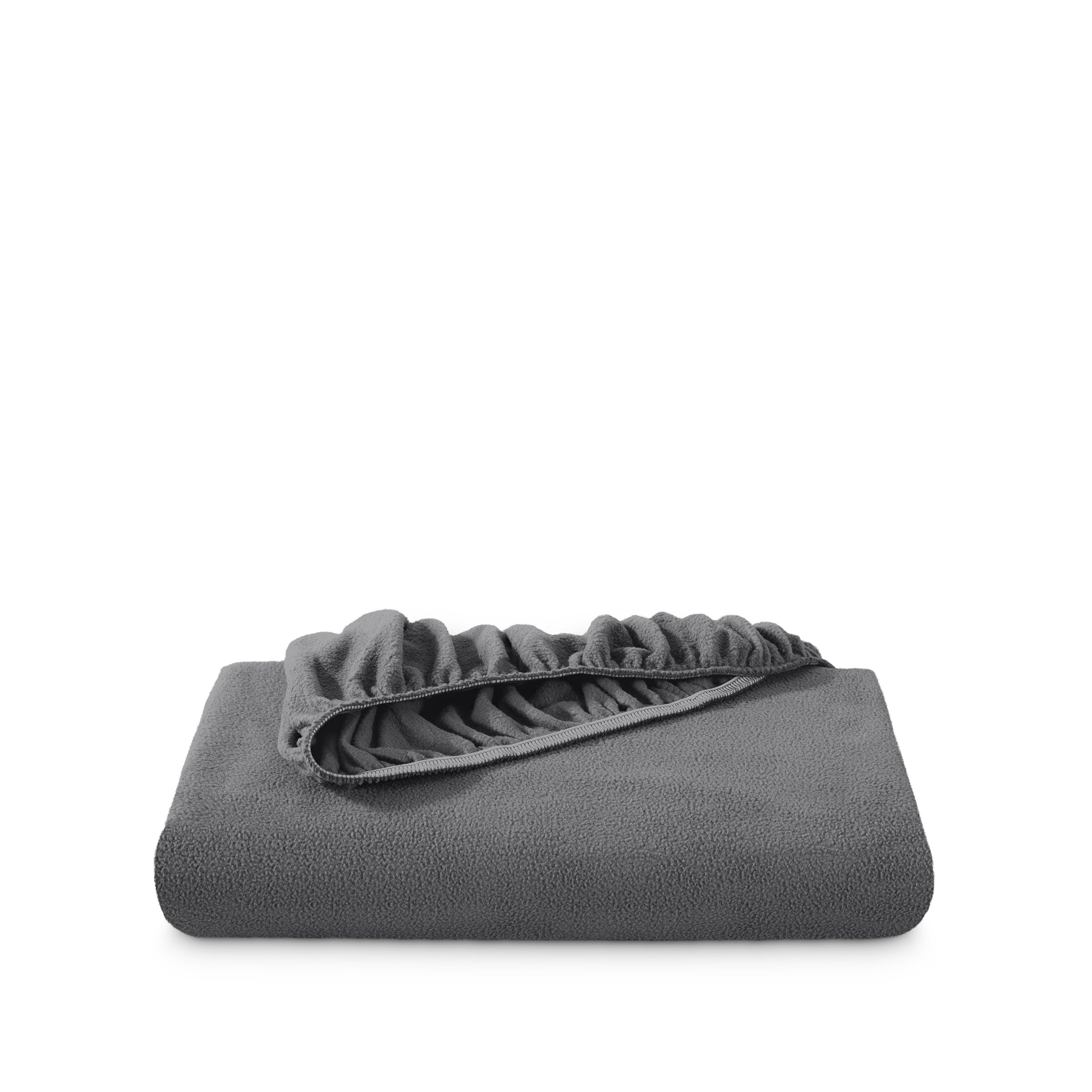A polar fleece fitted sheet folded