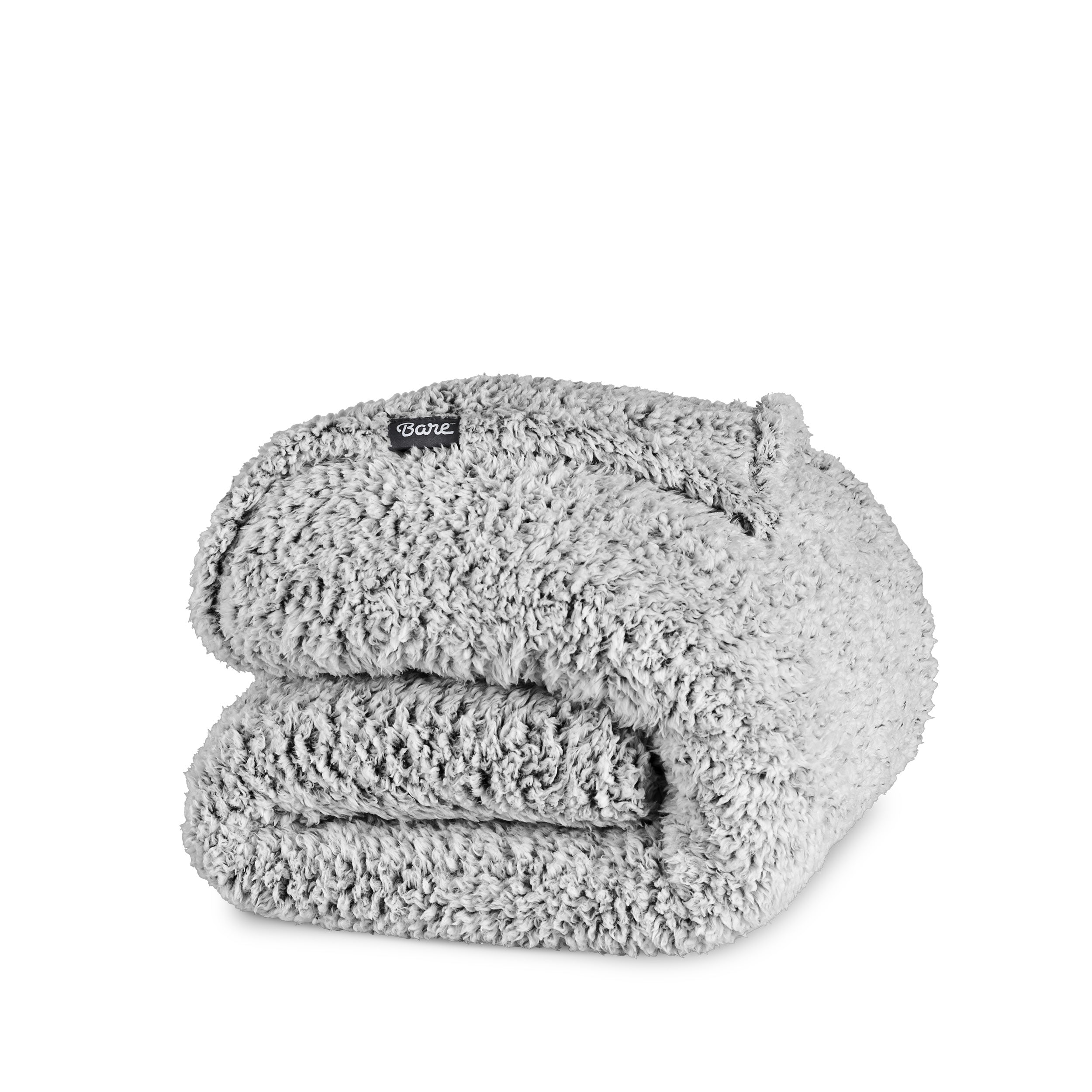 A tipped sherpa blanket folded neatly