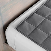 Close-up of a weighted blanket on a bed