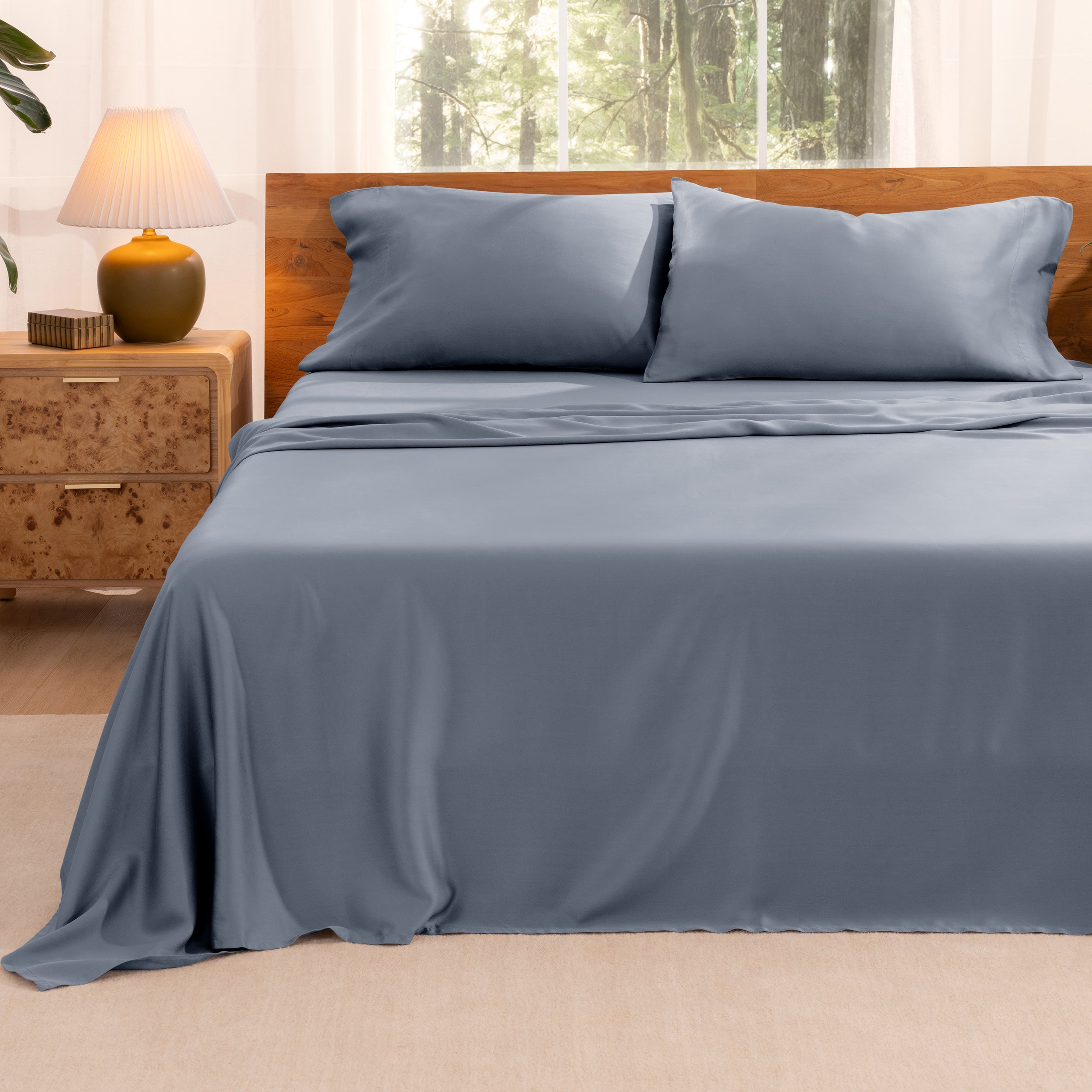 A bed neatly made with sheets