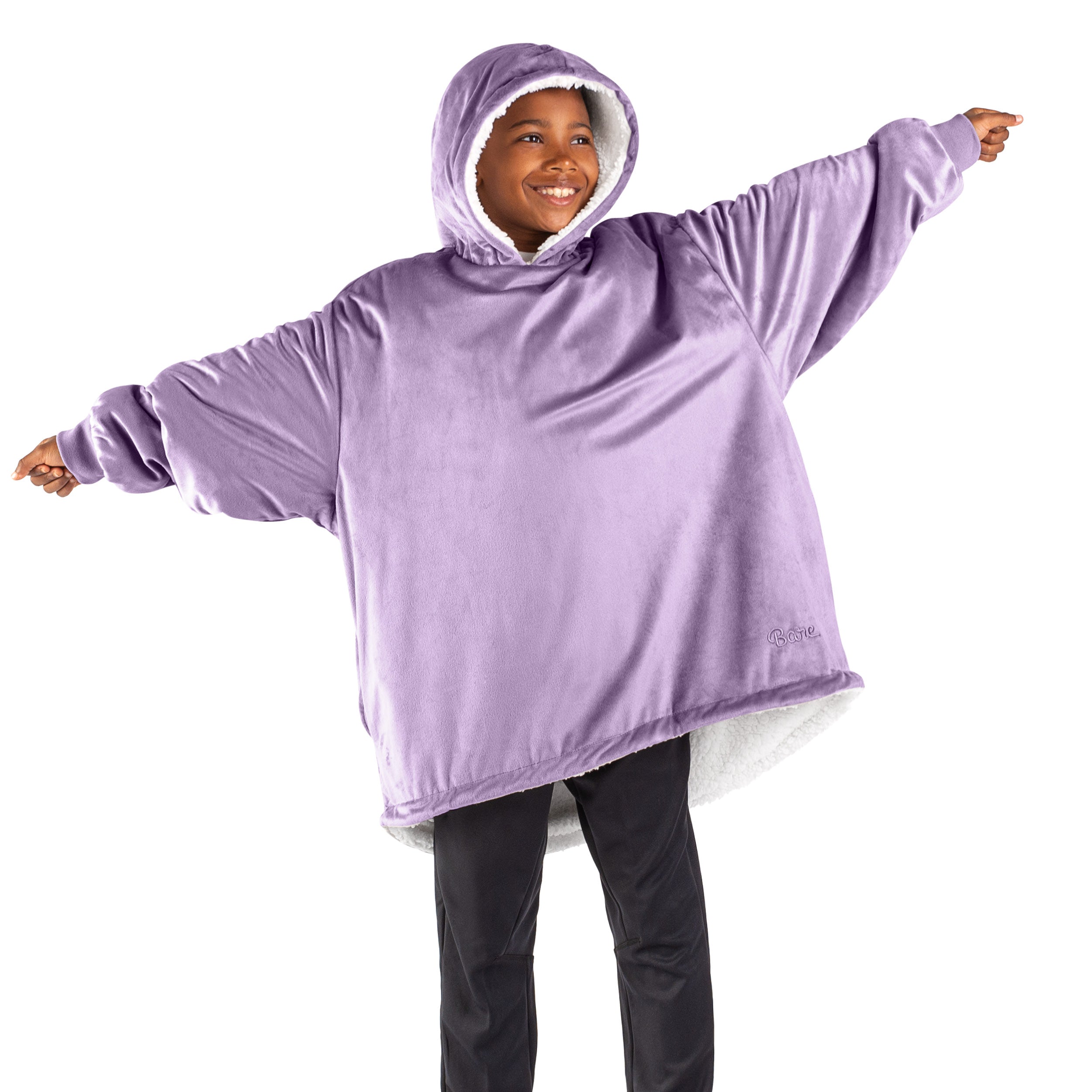 A youth wearable blanket on a child