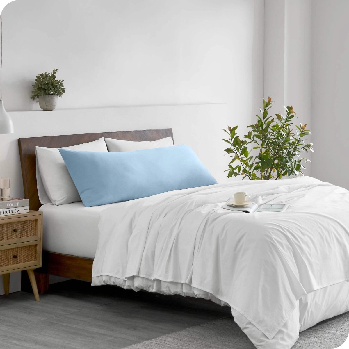 A body pillowcase on a pillow on a bed in a modern bedroom
