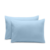 2 pillowcases on pillows