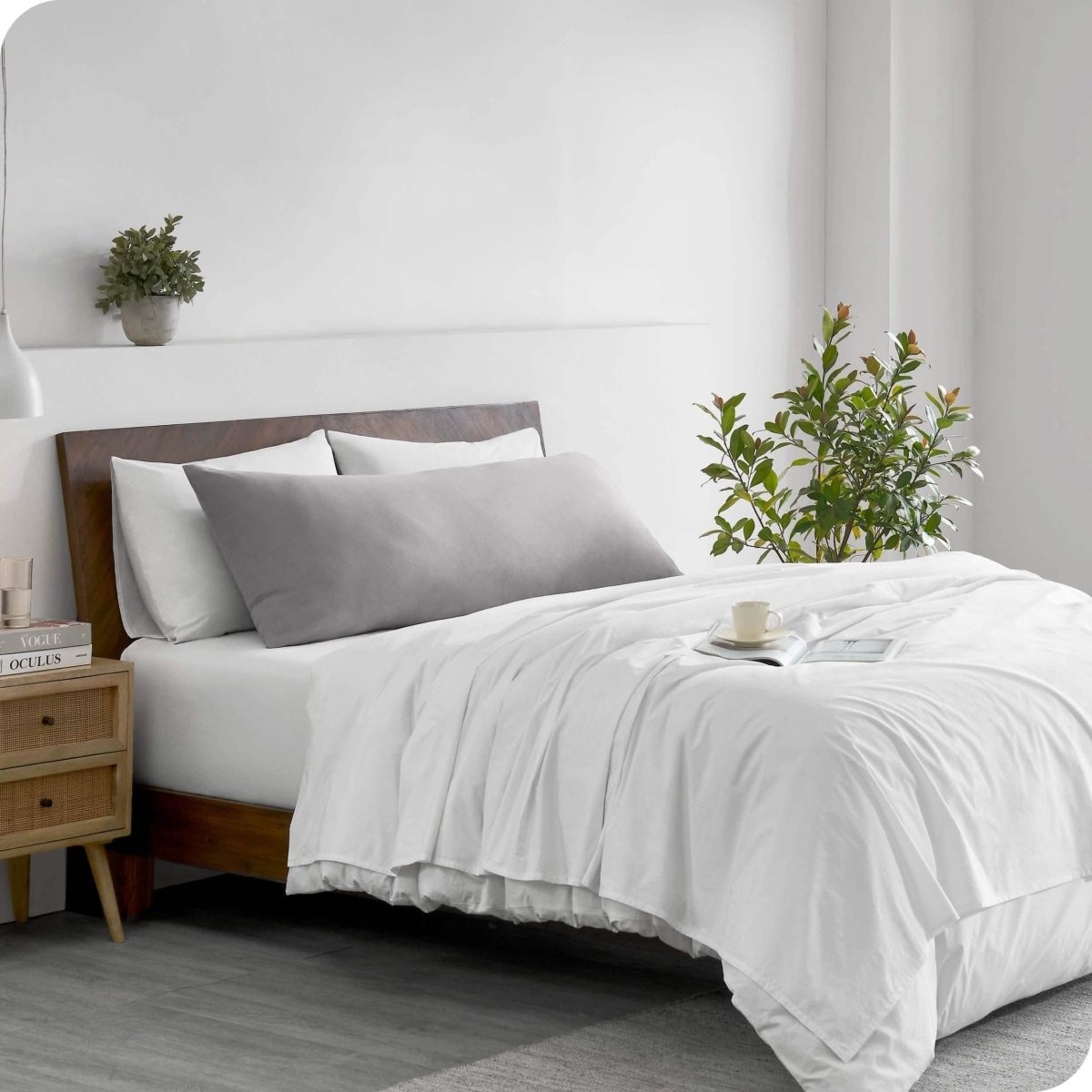 A body pillowcase on a pillow on a bed in a modern bedroom