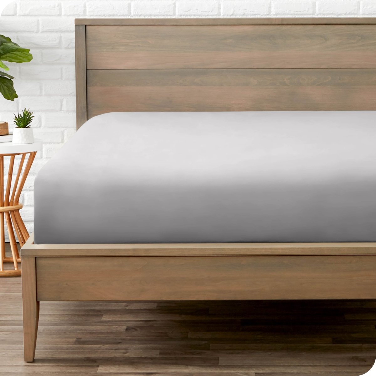 A mattress with just a fitted sheet on it
