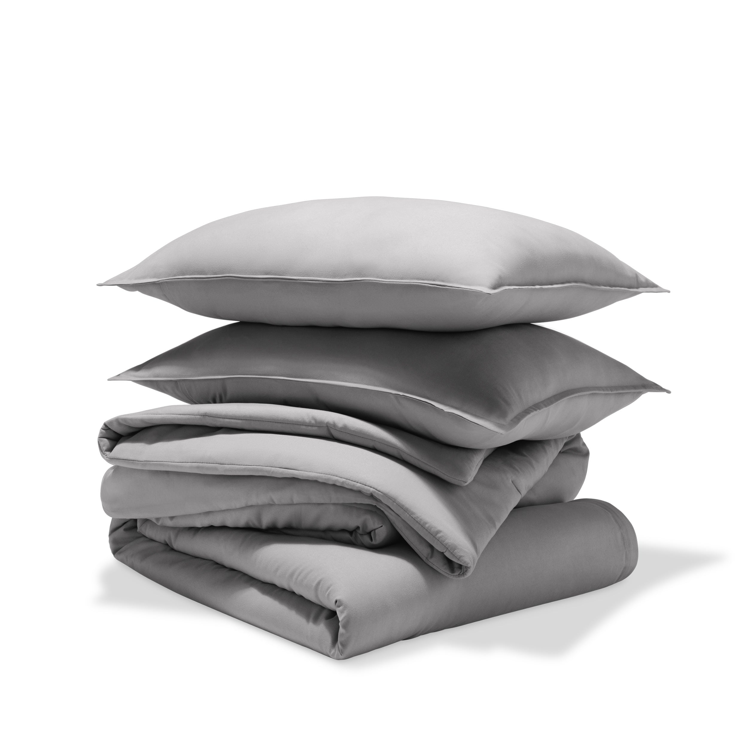 A comforter set folded and stacked