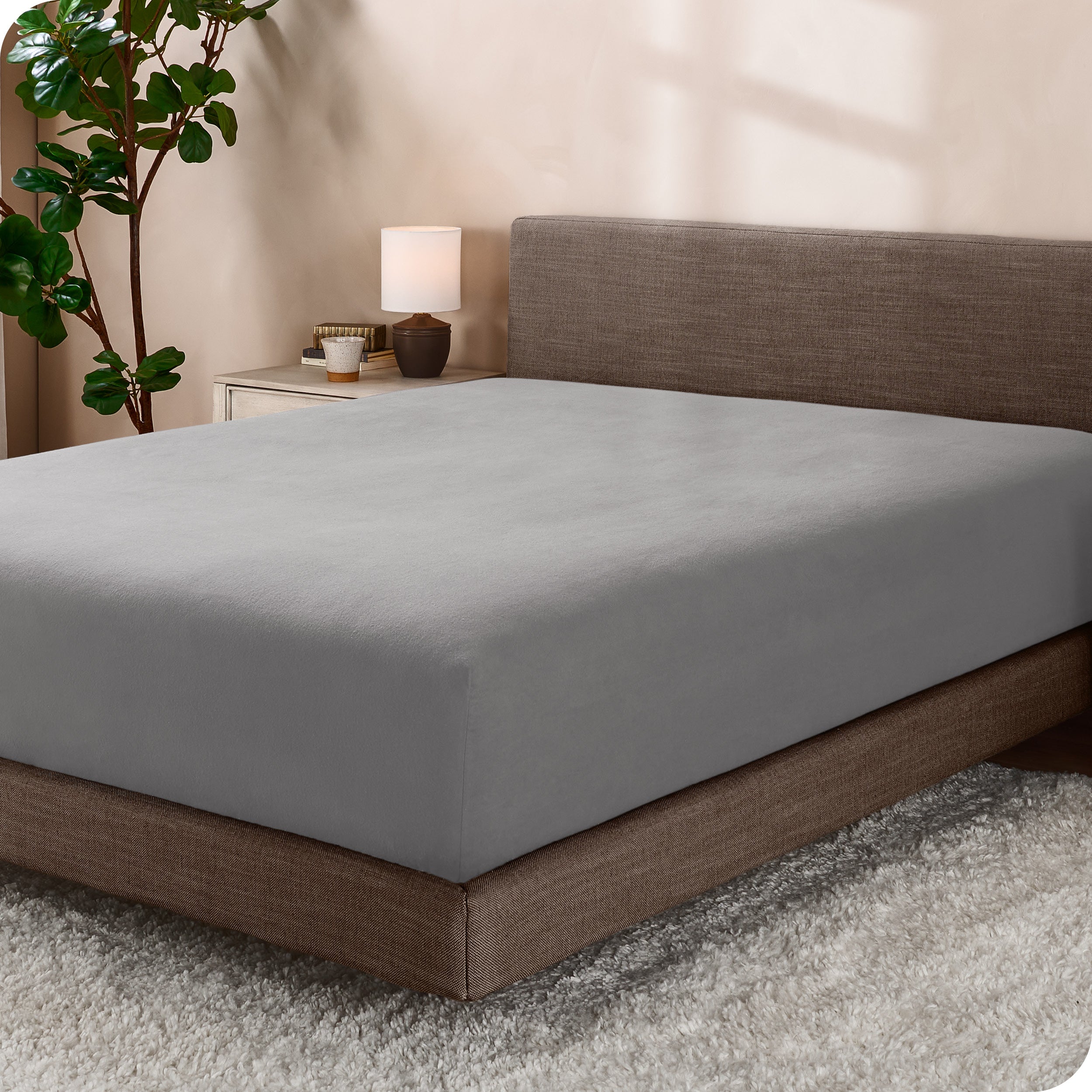 A single fleece fitted sheet on a bed
