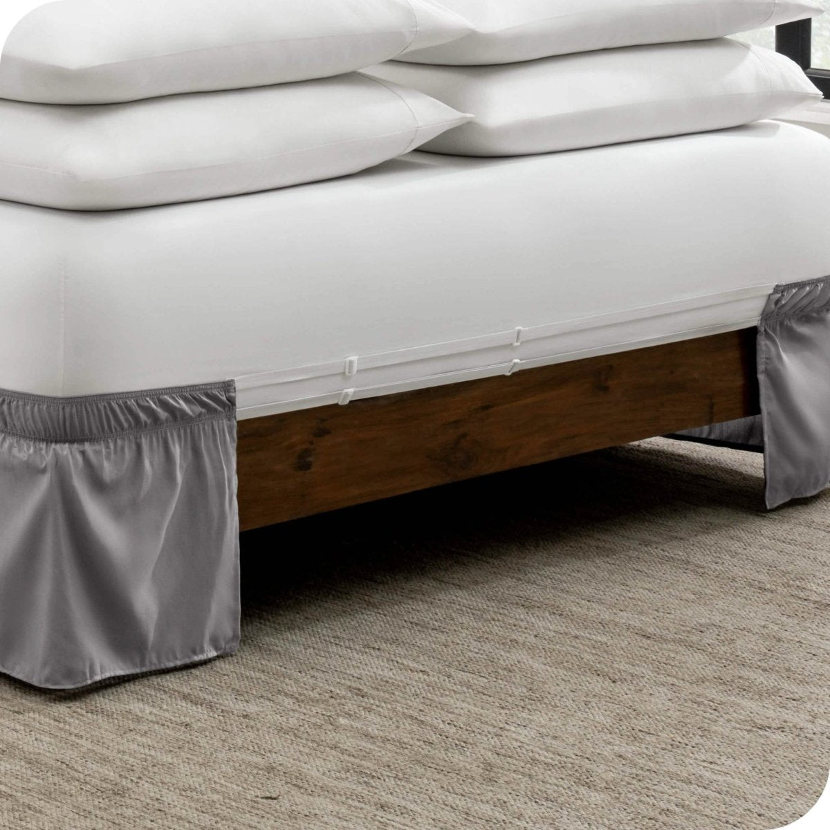 The adjustable elastic bands on a bed skirt
