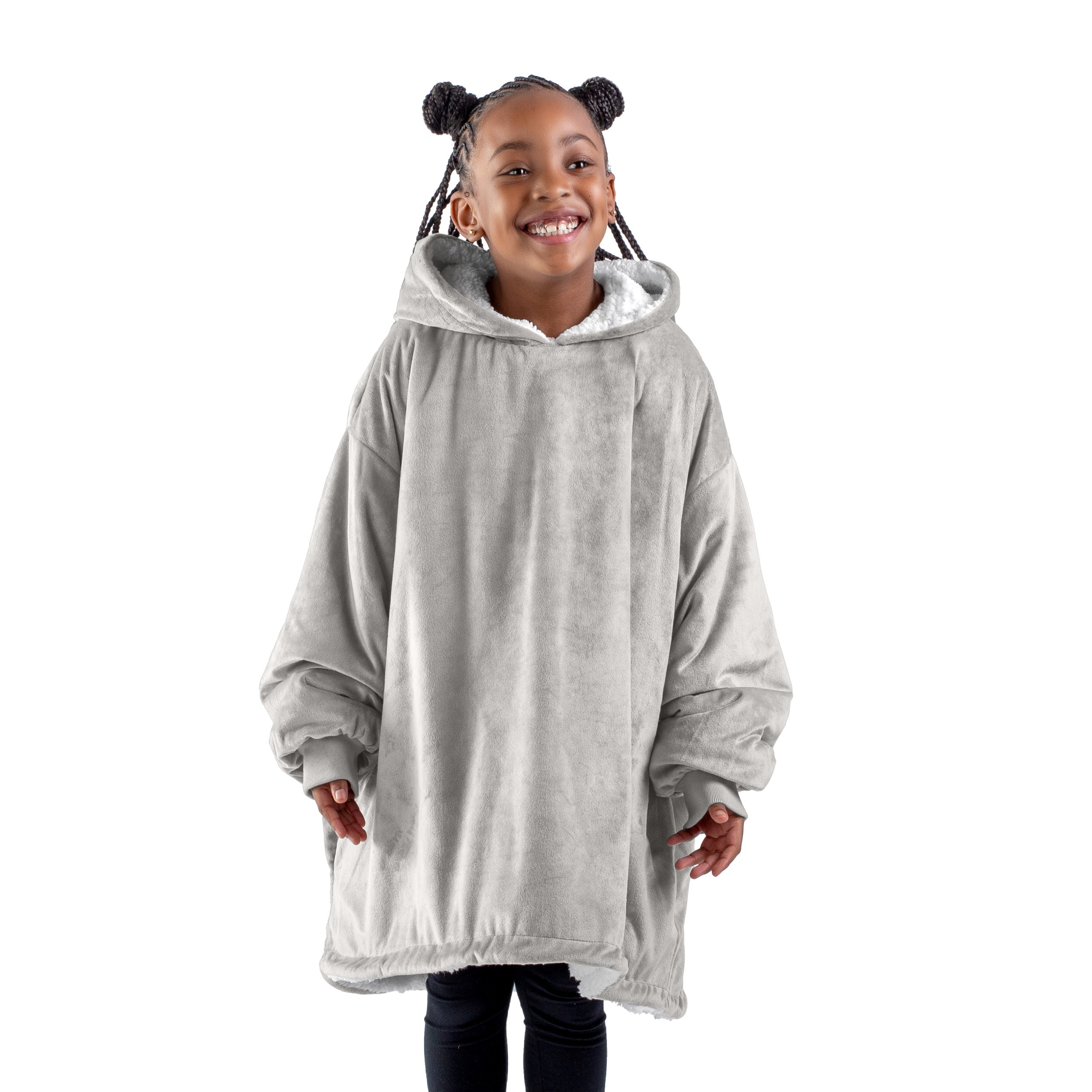 A child with a sherpa wearable blanket on
