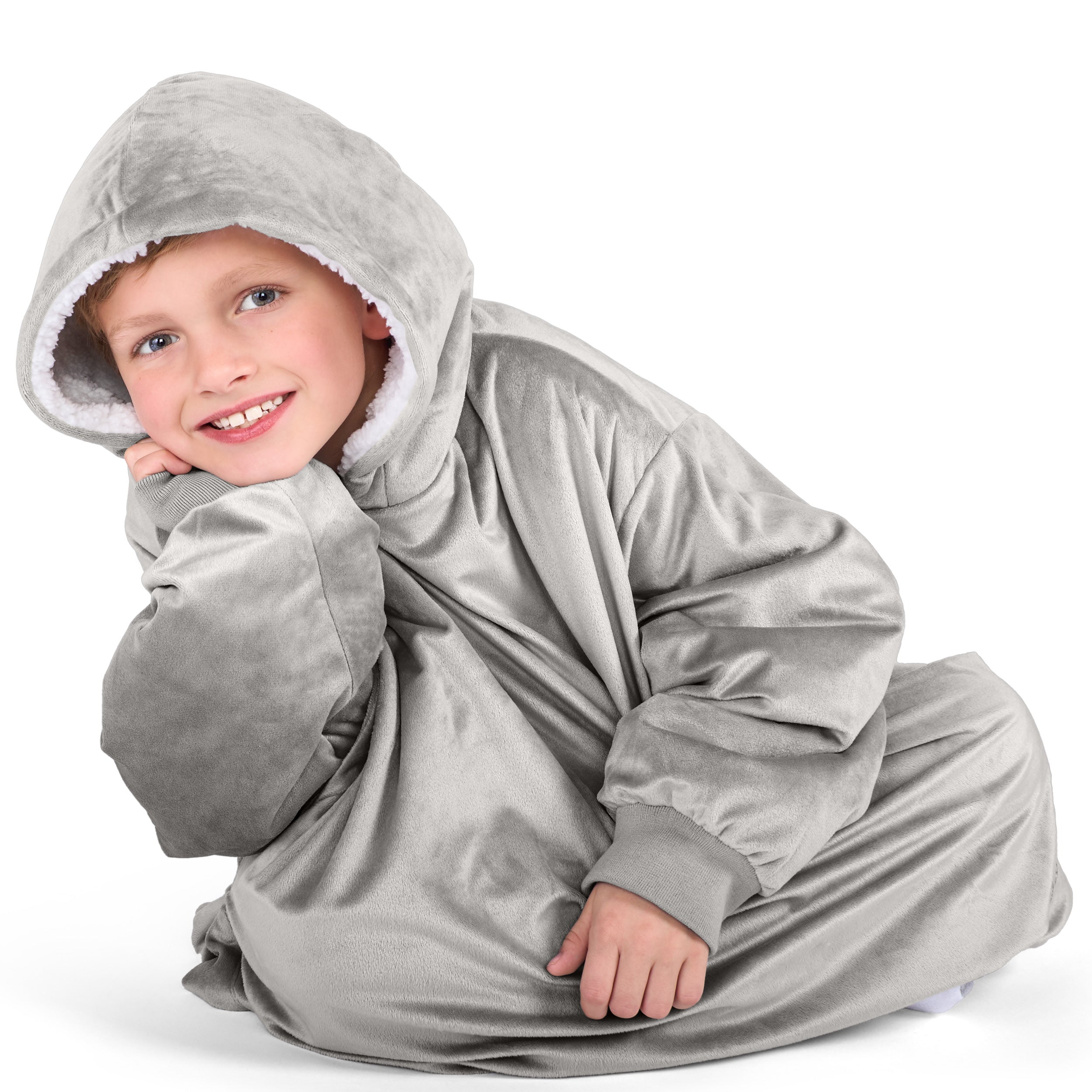 Close up of a sherpa wearable blanket on a child