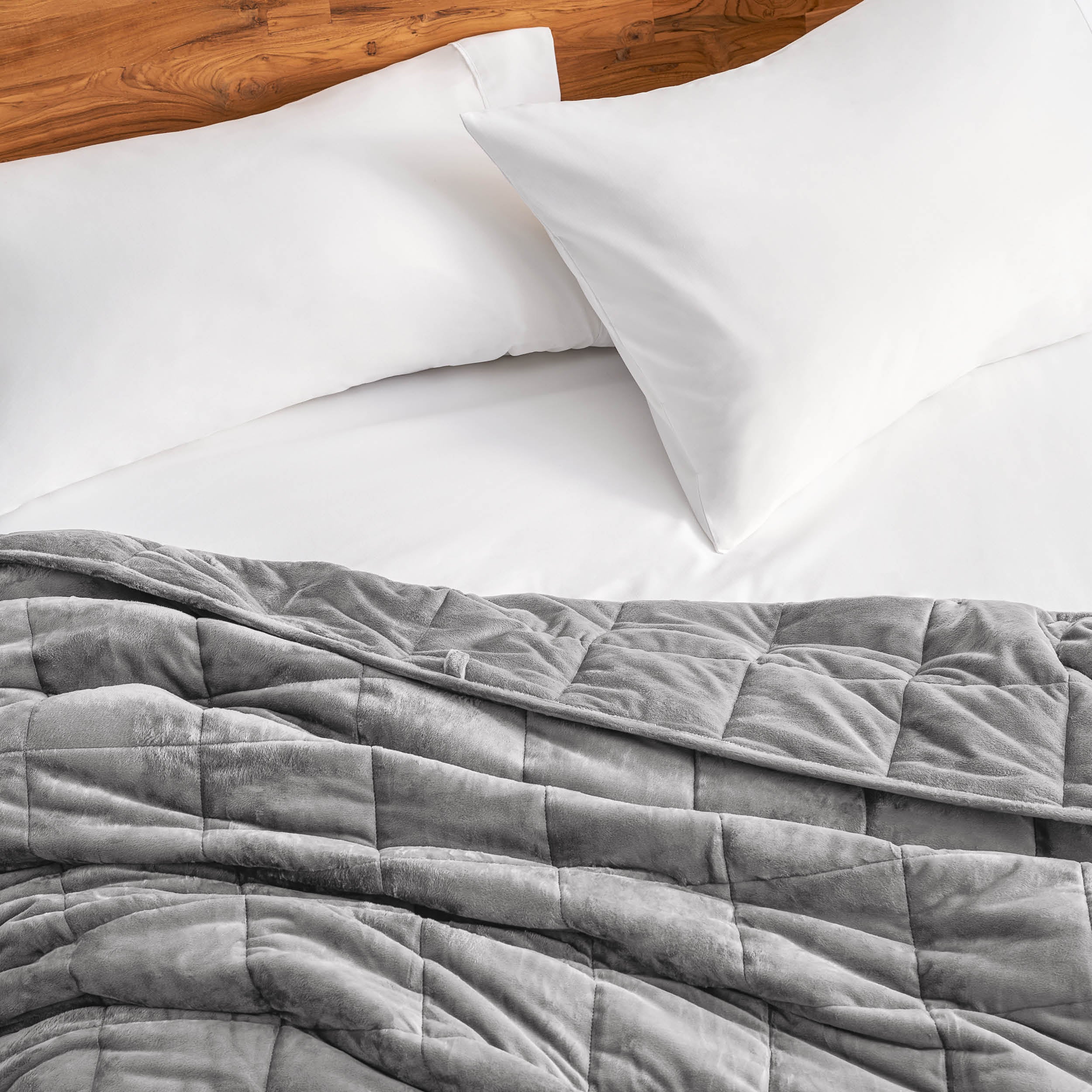 Close-up of a minky weighted blanket on a bed