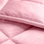 Close-up of a weighted blanket showing the stitching and texture