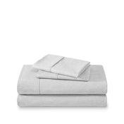 Set of bed sheets folded on a white background