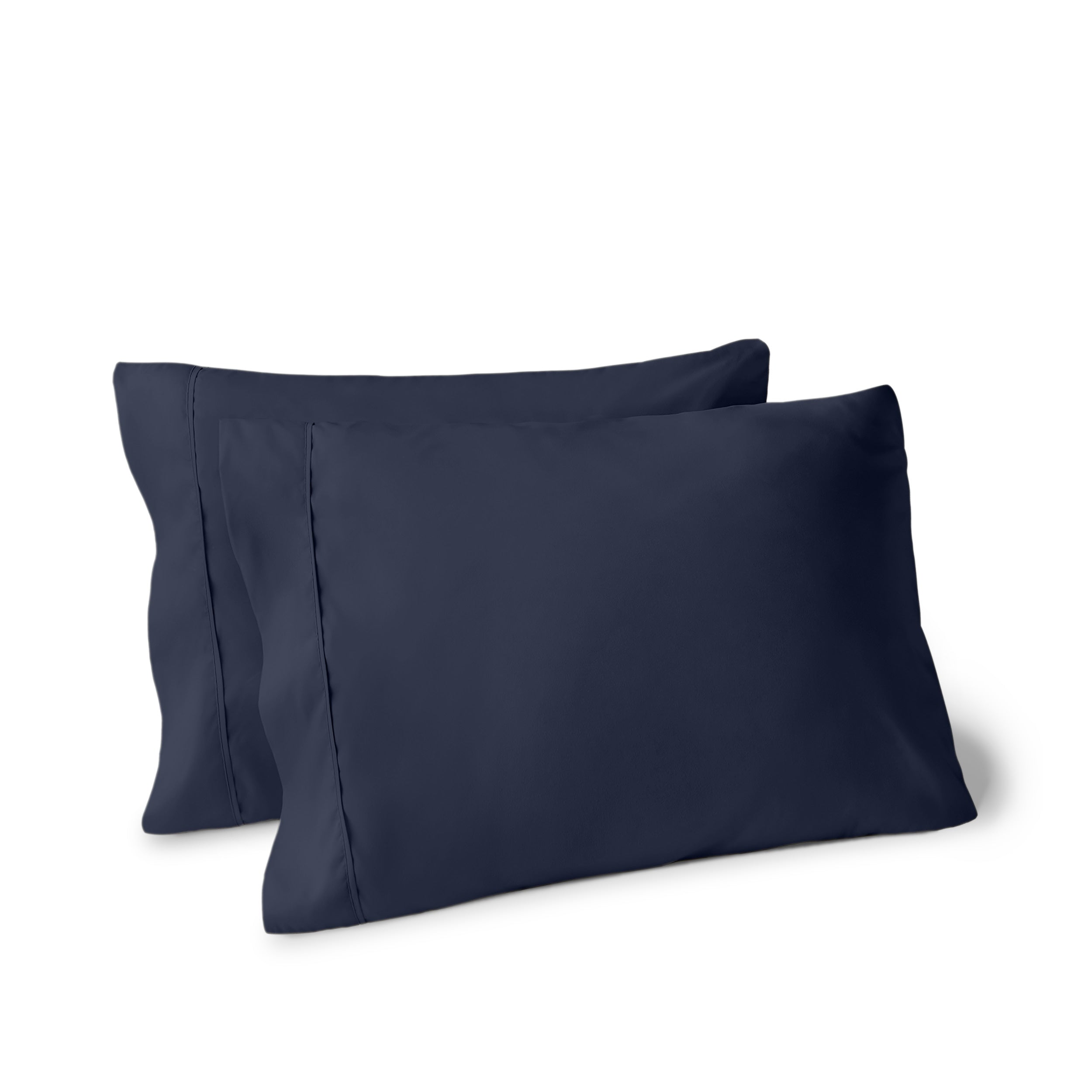 Two pillows on a white background with pillowcases on them