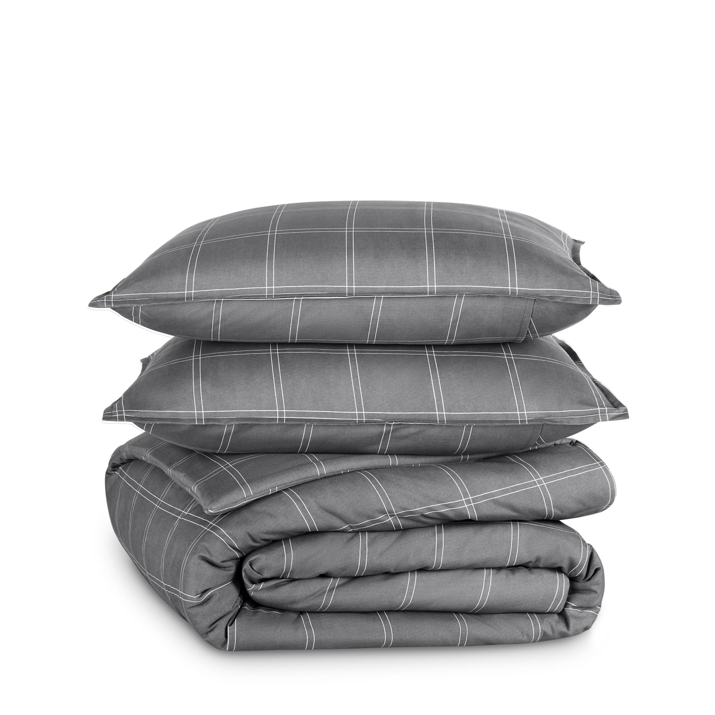 A printed comforter set folded and stacked