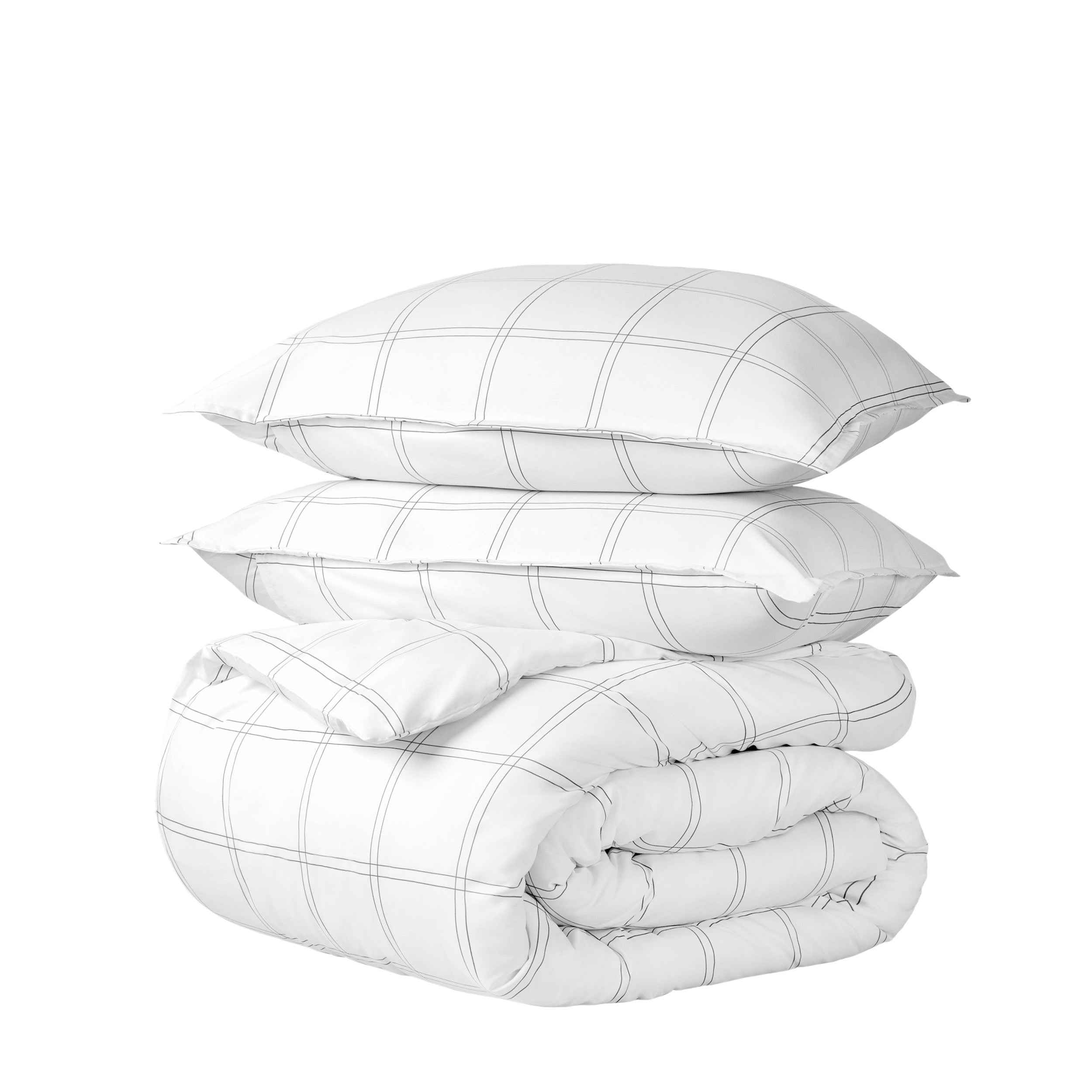 A printed comforter set folded and stacked