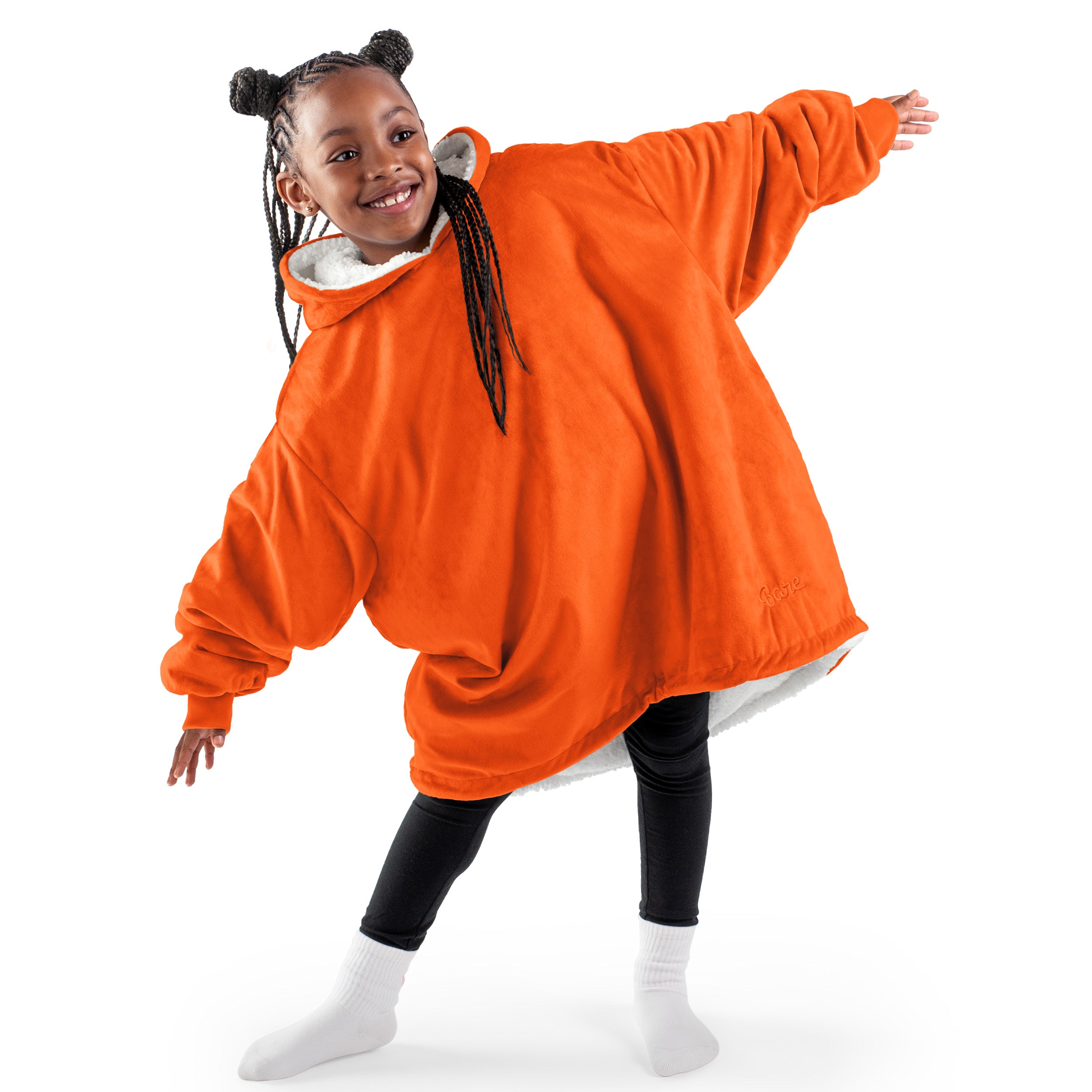 A youth wearable blanket on a child