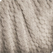Close up of microplush waffle textured blanket