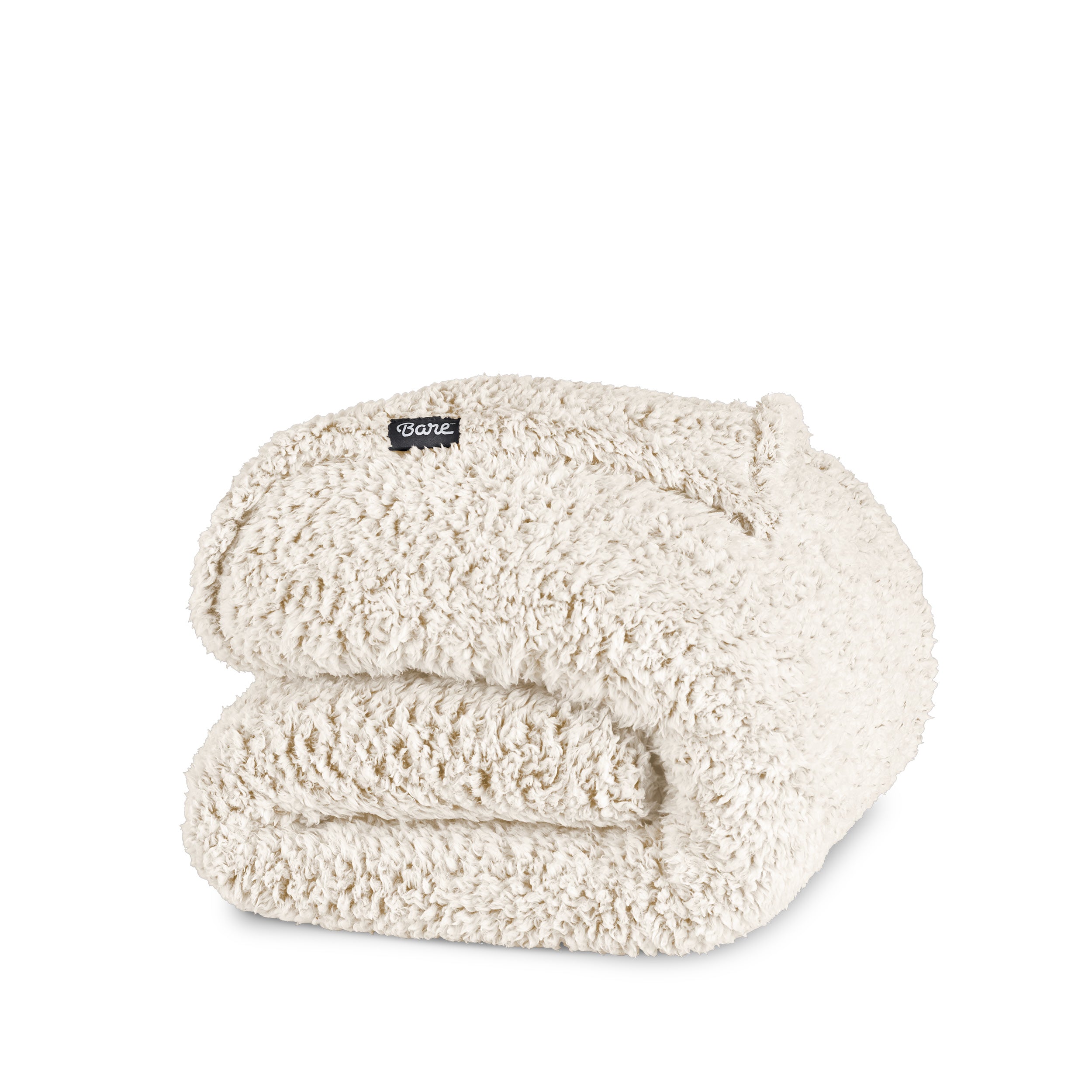 A tipped sherpa blanket folded neatly