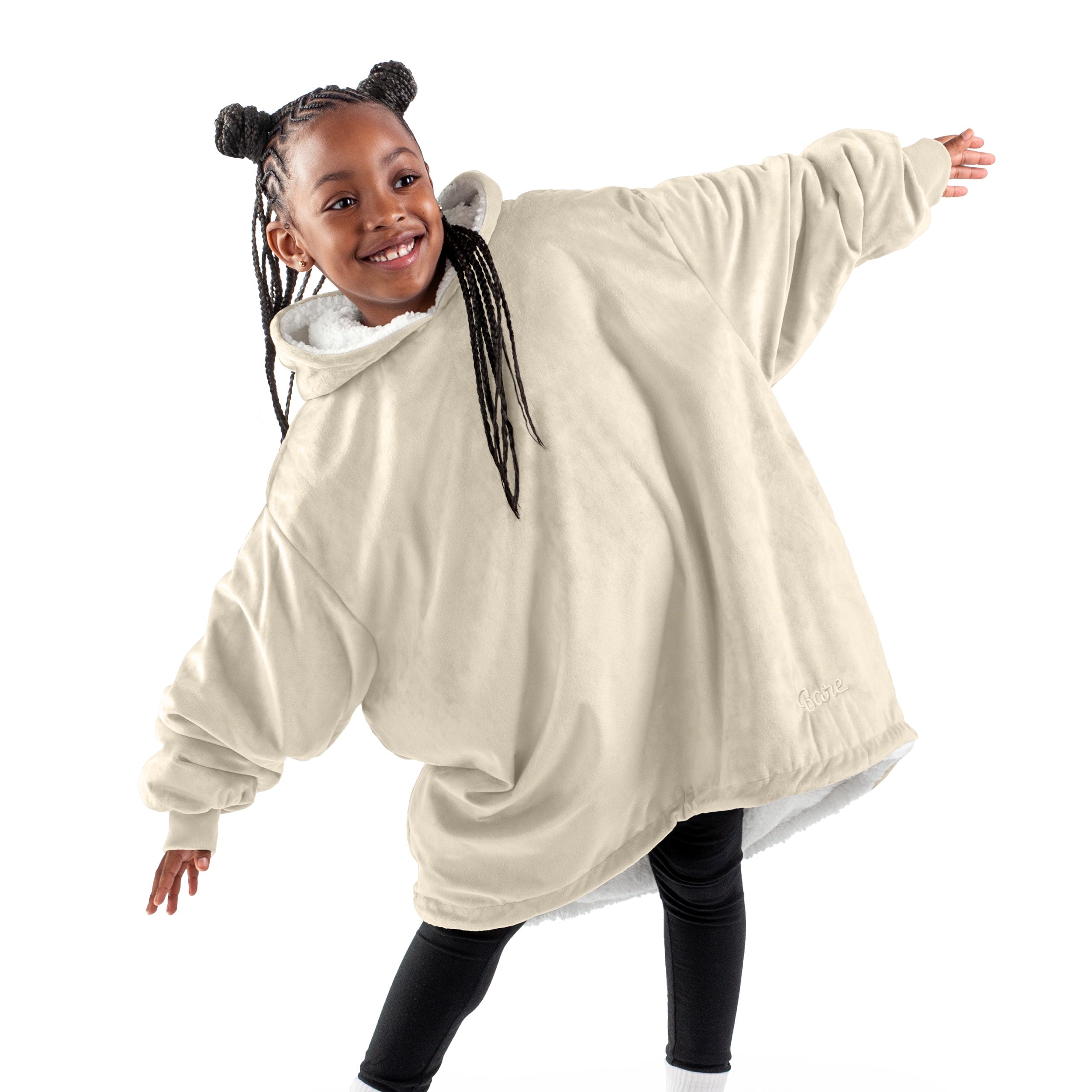 A child with a wearable blanket on