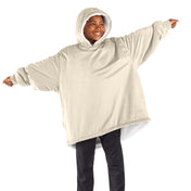 A youth wearable blanket on a child