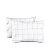2 printed microfiber pillowcases on pillows
