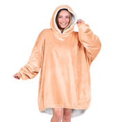 An adult with a sherpa wearable blanket on