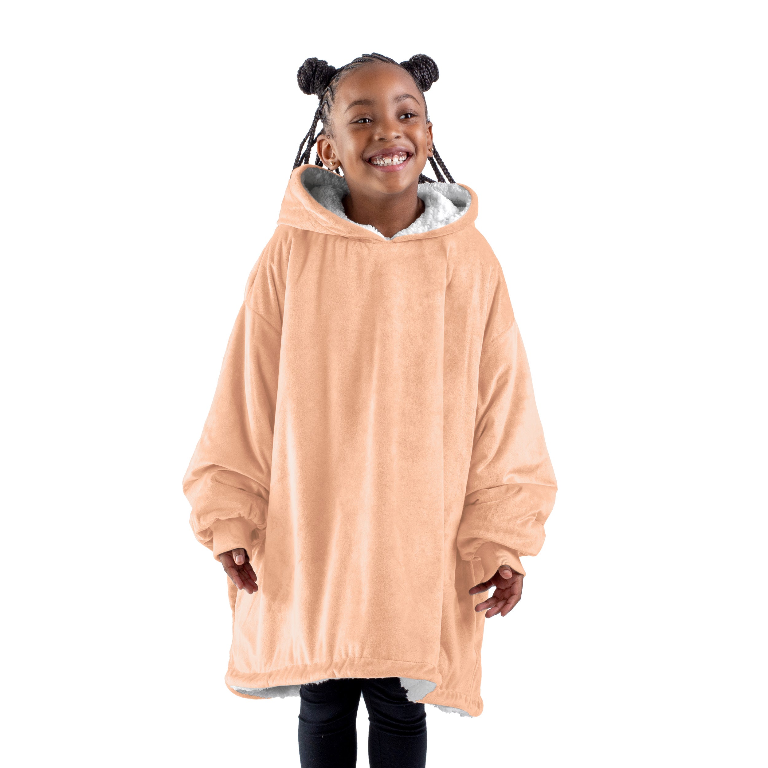 A child with a sherpa wearable blanket on